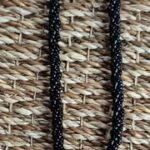 Kette “ Bijou Brigitte “ in Schwarz/Perlmutt/Schnecke