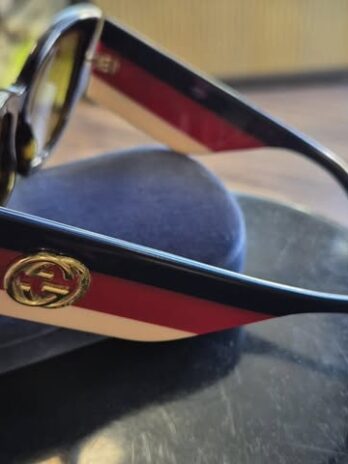 Sonnenbrille mit Etui “ Gucci “ in Braun/Blau/Rot/Weiß